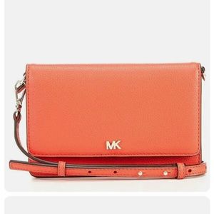 MK Jet Set Small Pebbled Leather Smartphone Convertible Crossbody Bag.